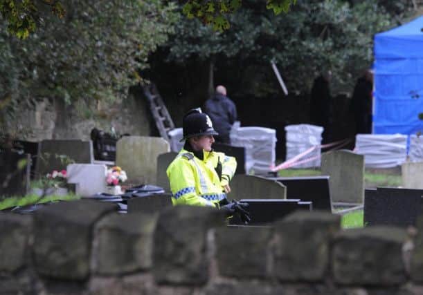 Police exhume a grave at St Aiden's Church in the hunt for Helen's remains