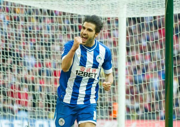 Jordi Gomez scores at Wembley for Wigan in the 2014 FA Cup semi-final against Arsenal