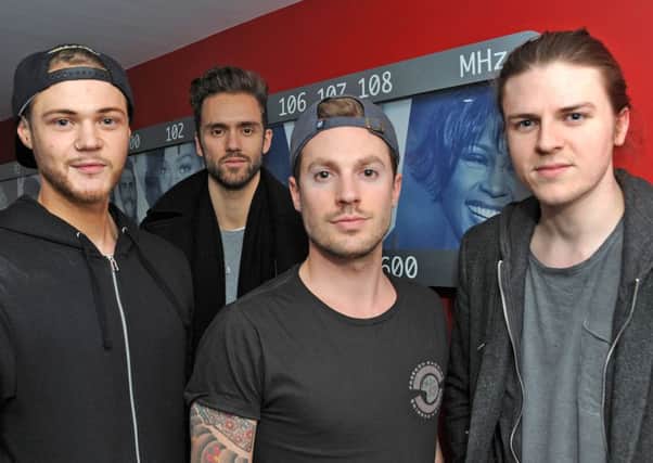 Lawson's , Joel Peat, right, and Ryan Fetcher, left, with other band members, Andy Brown and Adam Pitt