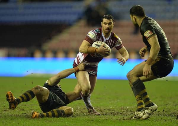 Matty Smith is tackled against Catalans last week