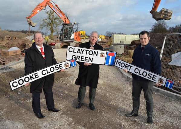 Dave Heyes, coun David Molyneux and Rob Holcroft on the site of the new housing estate