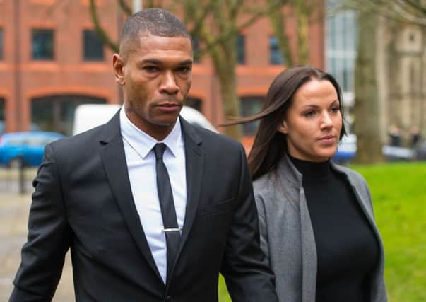 Former Latics striker Marcus Bent and his partner arrive at Guildford Magistrates' Court, Surrey, where he faces a potential jail sentence