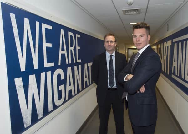 Wigan Athletic chairman David Sharpe and chief executive Jonathan Jackson