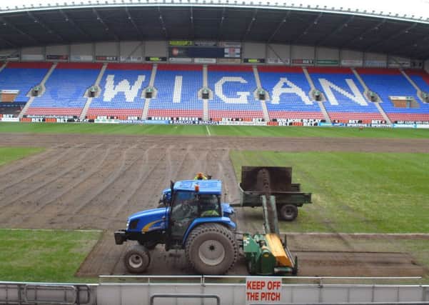 DW Stadium new playing surface being laid