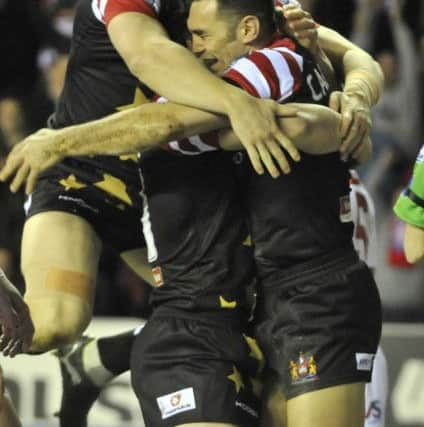 Ryan Hoffman celebrates with Sean O Loughlin and George Carmont
Wigan Warriors v St George Illawara
World Club Championship