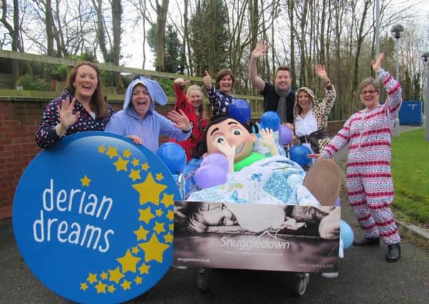 Susie Poppitt, Head of Fundraising for Derian House, along with the Community Fundraising Team, Sophie Saunders, John Rullo, Judy Miller and Jo Moss and a group of young people from Derian Lodge and Mayor of Chorley, Marion Lowe, launched the Derian Dreams Campaign, supported by Snuggledown, in Ashton