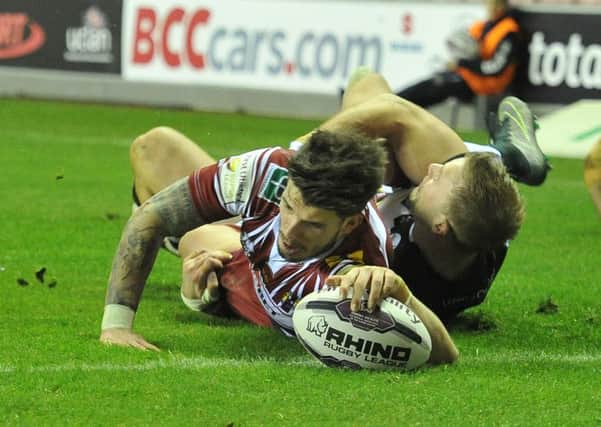 Wigan Warriors' Oliver Gildart  scores his and his team's second try