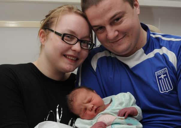 Kimberley and John Baybutt from Wigan with baby Jessica