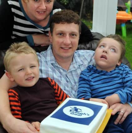 Joseph Kendrick and his family, dad, Paul, mum, Emma and brother, Sam celebrate the second anniversary of the Joseph's Goal charity