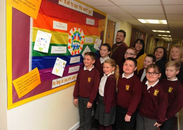 Pupils pictured with, back row from left, youth workers Scott Williams and Elaine Davies, headteacher Carrie Morrow and Councillor Jo Platt
