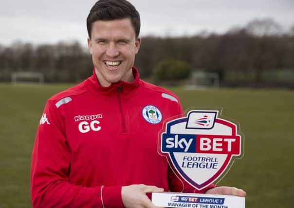 Wigan Athletic Manager Gary Caldwell with his SkyBet League One Manager of Month Award for February