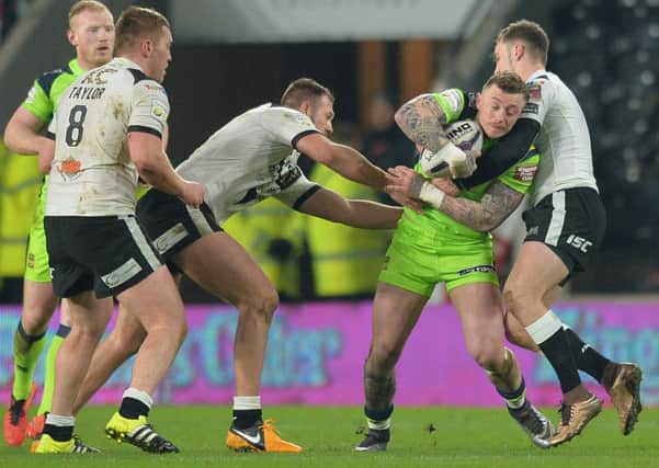 Josh Charnley in action against Hull FC