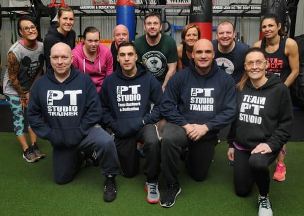 Trainers and members at The PT Studio