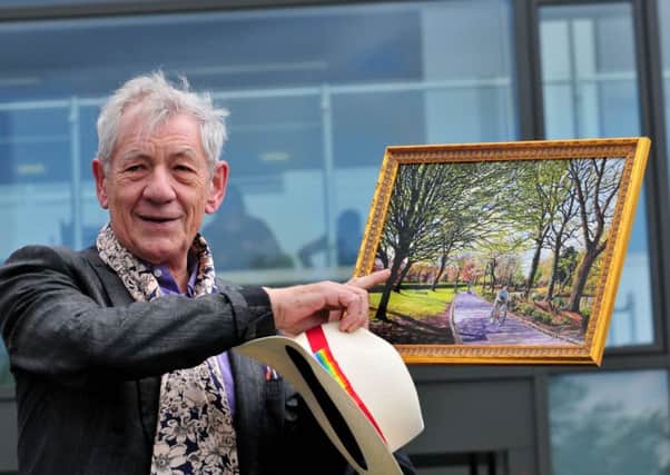 Sir Ian McKeellen shows where his house was on Parson Walk during his visit to Wigan last year