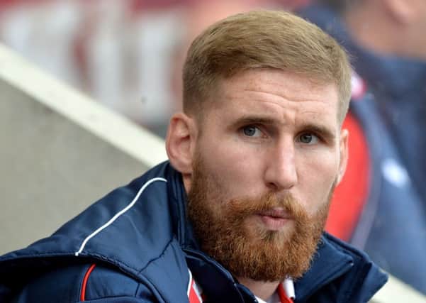 Wigan owner Ian Lenagan predicted Sam Tomkins would be fit for Easter