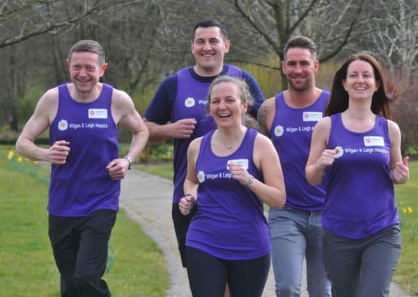 Runners who will be raising funds for Wigan and Leigh Hospice as they take part in the London Marathon 2016