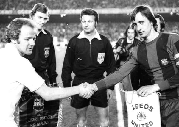 Leeds skipper Billy Bremner and Johan Cruyff at the Nou Camp in April 1975