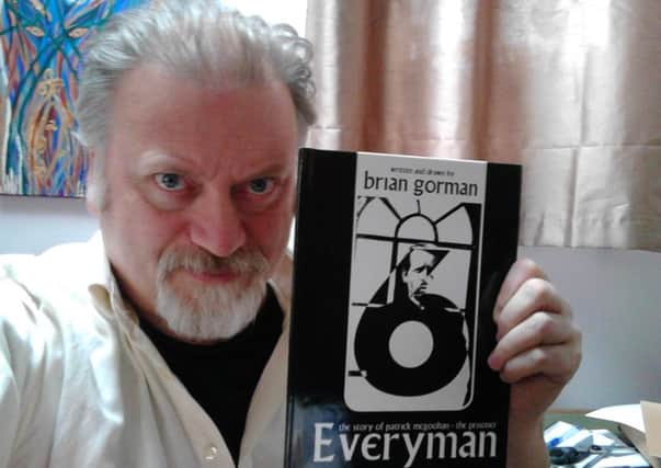 Author Brian Gorman with his graphic novel Everyman