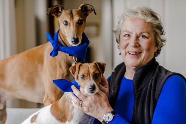 Pam Ferris, pictured with her dogs Stan and Elsie, appeals for people to join in the Paws for Tea tea party. See letter below