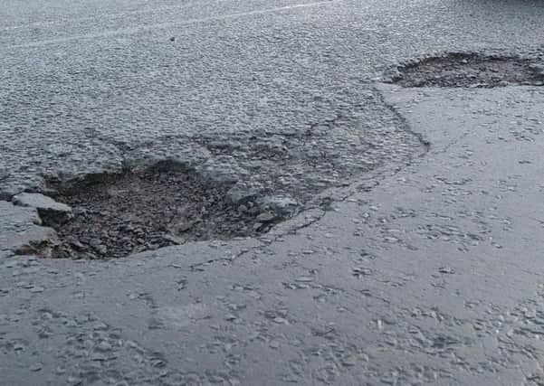 Wigan Council is to receive Â£195,000 to fill 3,679 potholes in the borough
