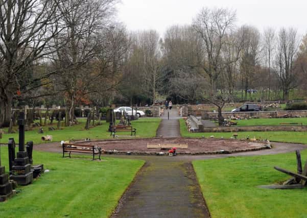 Graves at Wigan Crematorium were ransacked by a thief