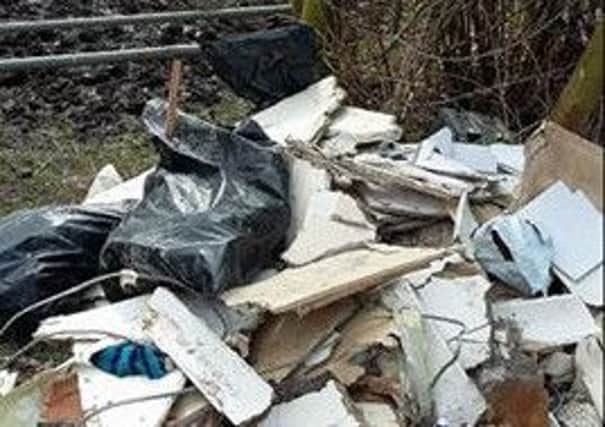 Rubbish dumped in Cheetham House Farm, Park Lane, Abram