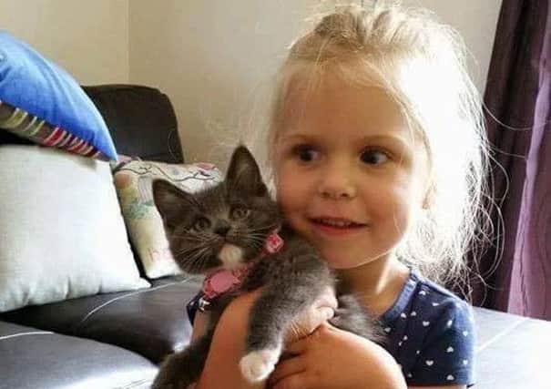 Alia with her pet cat Sky, of Westleigh. Sky died after ingesting antifreeze