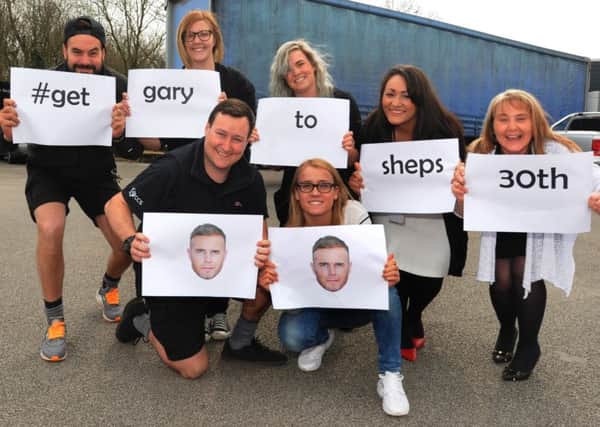 Laura Shepherd from Wigan, second from right, with colleagues from Central Catering Services Ltd, who are supporting her in a Twitter campaign to try and get singer Gary Barlow to perform at her 30th birthday