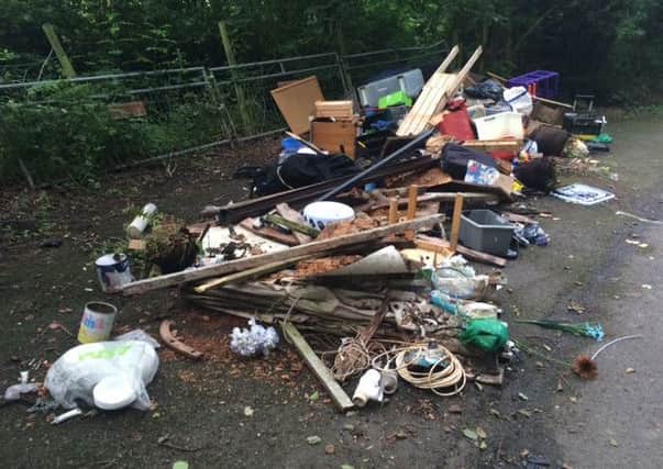 The fly-tipped waste at College Road, Up Holland