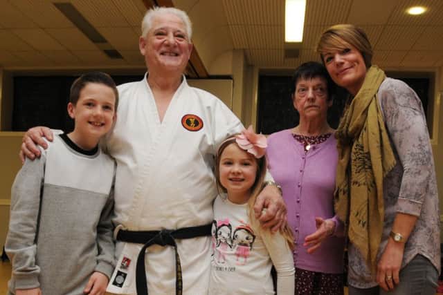 Sensei Tony Christian with wife Pauline, daughter Rachel and two of his four grandchildren, Olivia and Alex