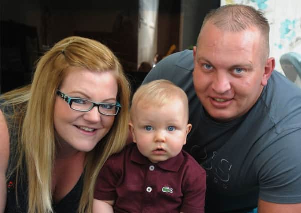 Emma Doherty and John Baldwin with 11-month-old Bobby