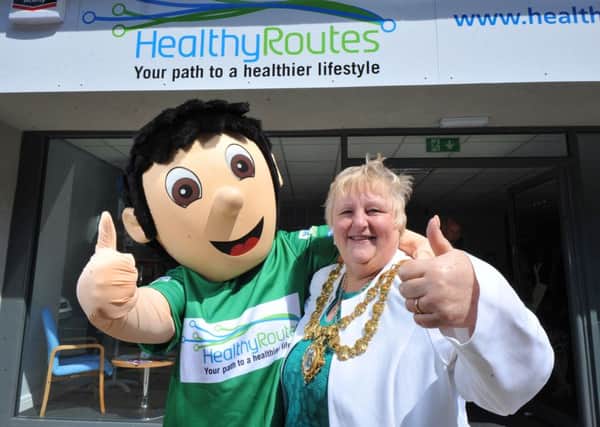 Wigan Mayor Coun Susan Loudon with the mascot at Healthy Routes on the High Street launch at Crompton Street