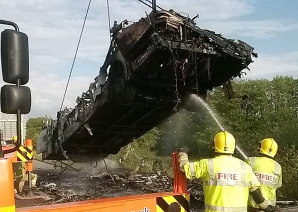 A coach burst into flames on the M6 northbound