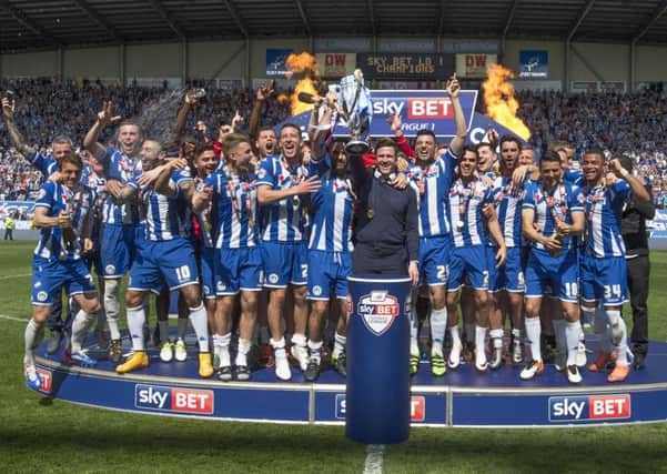Latics with the League One trophy