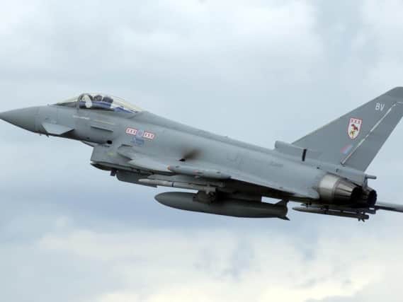An Eurofighter Typhoon aircraft takes to the sky. A reader says  being part of the EU is good for manufacturing industries. See letter