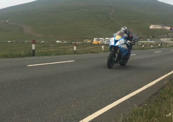 Wigans John Ingram speeds past the Bungalow section of the Isle of Man TT