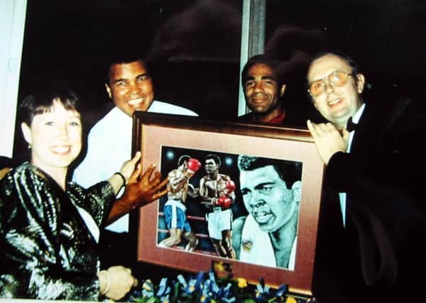 Doreen and Brian Meadows with Ali at a dinner in America