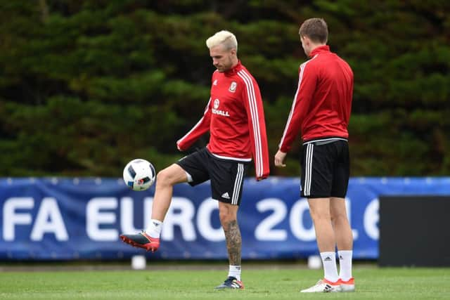 Aaron Ramseys bleached blond style on show during Euro preparations. Credit PA