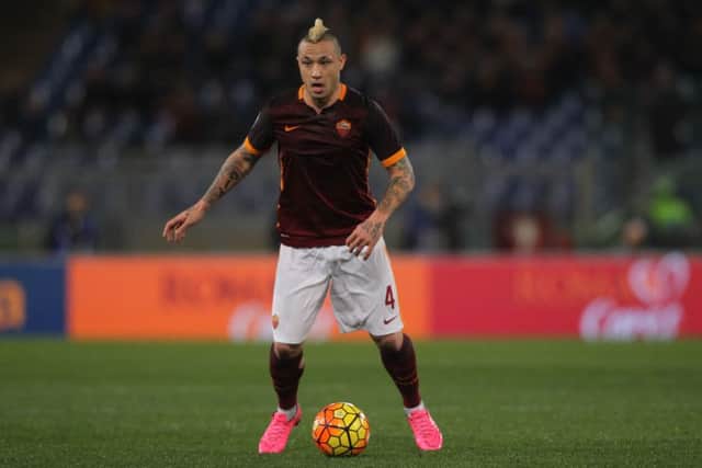 The winner of our worst hair in the Euros award, Radja Nainggolan lining up for club side Roma. Credit, Shutterstock