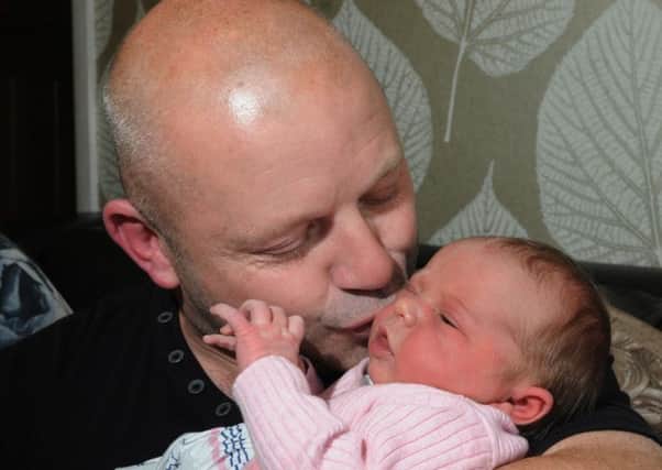 Proud dad Warren Clough had an unforgetable Father's Day as he delivered his daughter baby Maisie at home