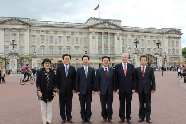 General Pastor Kim Joo-Cheol (third from right) at the Buckingham Palace Garden Party