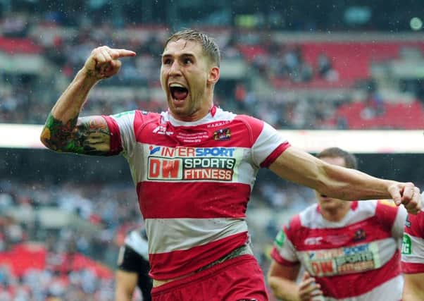 Sam Tomkins celebrates his try in the 2013 Challenge Cup Final