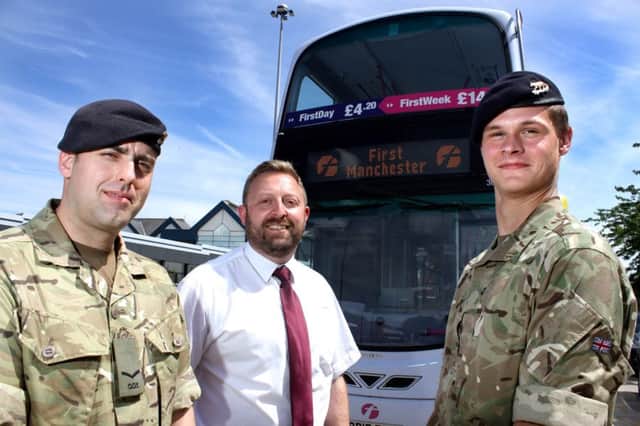 Soldiers from The Queens Own Yeomanry Squadron and Tony Clegg from First Manchester