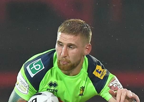 Sam Tomkins helped Wigan to victory