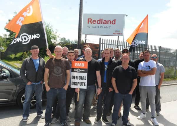 Members of the union on strike from Redland Wigan Plant, Monier, based off Cale Lane