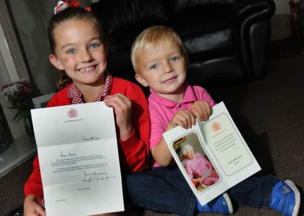 Ruby Thomas, 8, and brother Harry, 3