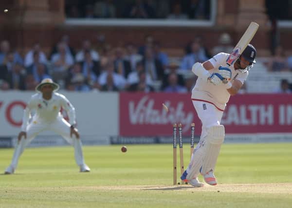 England's Stuart Broad is bowled out by Pakistan's Mohammad Amir