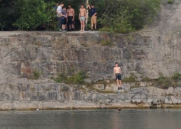 Teenagers caught tombstoning into the water at East Quarry in 2014