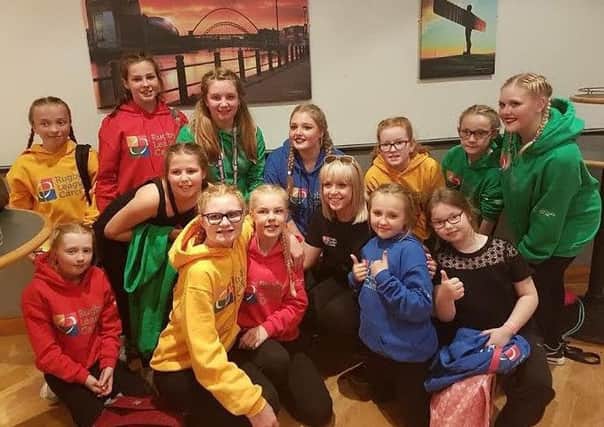Amy Burden with members of Leigh Community Dance
