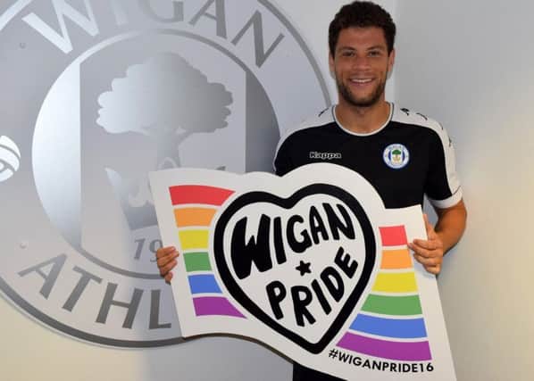Latics winger Yanic Wildschut showing support for the town's first Pride festival